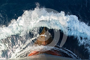 Red rusty bulb of a tanker.