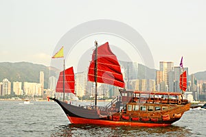 Red sail boat