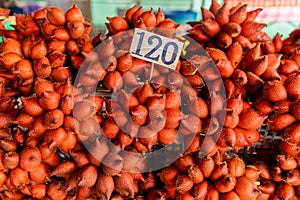 Red Salacca. Salak fruit. Salacca zalacca, Snake fruit background. Closeup Salak Palm