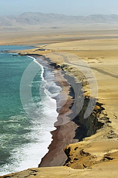 Red sand beach of Paracas National Reserve in Peru