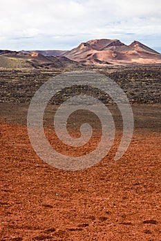 Red sand with crater at Timanfaya on Lanzarote Island