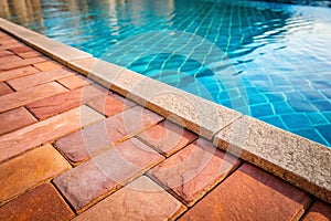 Red sand stone pavement with pool edge