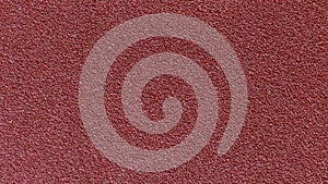 Red sandpaper texture background for industrial construction concept design