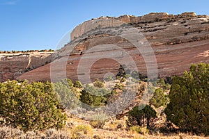 Red Sandstone Butte and vegetation in the Desert Utah Landscape