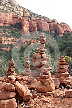 Red sandstone cairns of differing heights on the Devil\'s Bridge Trail in Sedona, Arizona