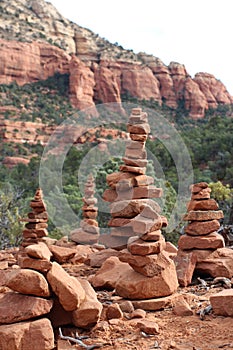 Red sandstone cairns of differing heights on the Devil\'s Bridge Trail in Sedona, Arizona photo