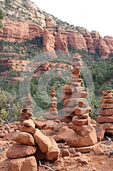 Red sandstone cairns of differing heights on the Devil\'s Bridge Trail in Sedona, Arizona photo