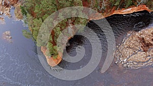 Red sandstone cliffs in the banks of river Salaca, Latvia