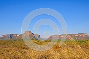 Red sandstone mountains, stone town city, beautiful landscape at Chapada dos Guimaraes, Mato Grosso, Brazil photo