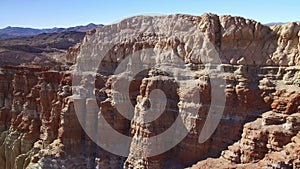 Red Sandstone Rock Formation in Mojave Desert California Aerial Shot Backward Right