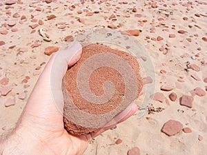 Red sandstone rocks on Prince Edward Island beach