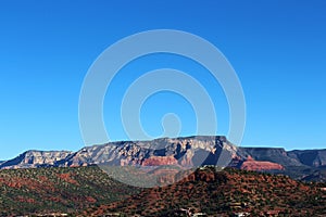 A red sandstone and white limestone mesa landscape in Sedona, Arizona, USA