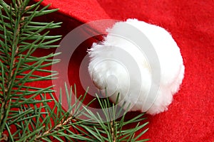 Red santa claus hat with white pompon