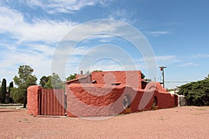 Red Sante Fe Design Adobe House Close Up.