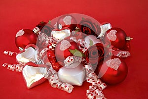 Red satin balls, silver hearts with roses and ribb