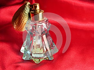 Red Satin and Perfume Bottle