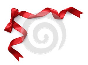 Red satin ribbon with bow photo