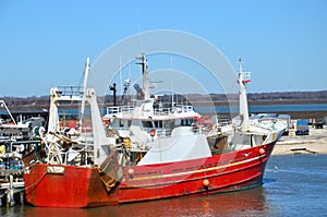 Red fishing boat or ship photo