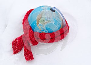 Red scarf earth globe sphere winter snow concept