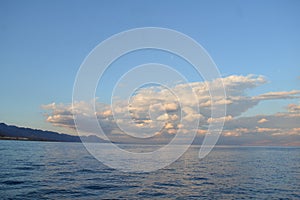 Red Sea with subtle clouds over the sea horizon