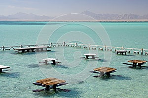 Red sea. View of the ships anchored and beautiful clouds. January in Egypt. Africa