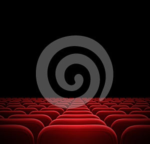 Red seats in dark cinema