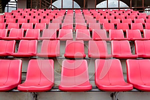 Red seats in football stadium
