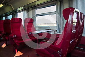 Red seats in a railcar