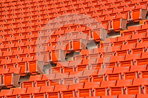 Red seats on stadium steps bleacher