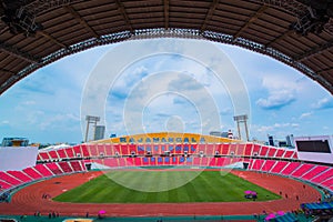 Red seats on stadium steps bleacher