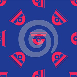 Red Security camera icon isolated seamless pattern on blue background. Vector