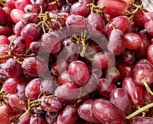 Red seedless grapes with stem background