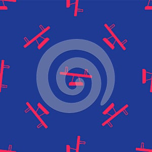Red Seesaw icon isolated seamless pattern on blue background. Teeter equal board. Playground symbol. Vector