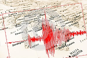 Red seismic wave over Italy map
