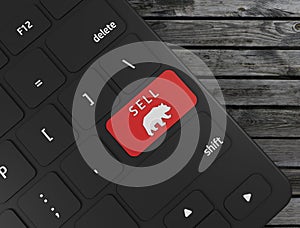 Red sell button with bear icon on computer keyboard,3d render