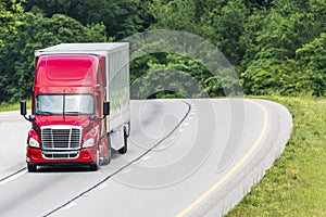 Red Semi Truck on Interstate With Copy Space