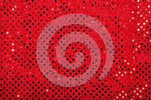 Red sequins pattern. Sparkling sequins background.
