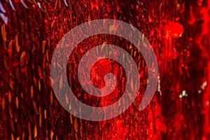 Red sequins pattern. Sparkling sequins background. Red sequin fabric for background. rectangular red shiny fabric