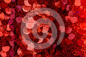 Red sequins pattern. Sparkling sequins background. Red sequin fabric for background. rectangular red shiny fabric