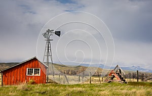 Red Shed and Old Windmill Farm Scene In Colorado