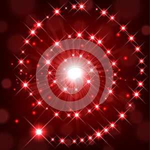 Red shine with sparkle forming spiral background