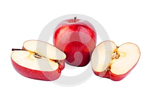 Red shiny apples whole apple and cut in halves on white background