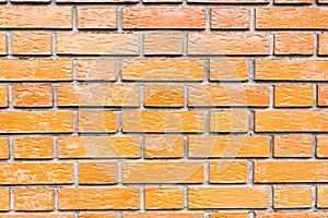 Red shiny brick wall