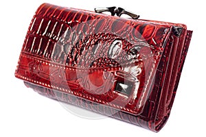 Red shiny purse isolated.