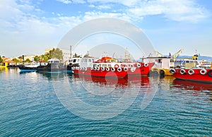 Red ships at Eleusis port Greece