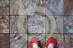 Red Shoes on a Beautiful Stone Floor Grid of Squares, Arquitecture Background. photo