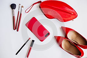 Red shoes, cosmetics and accessories.