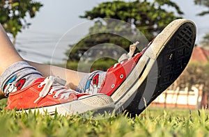 Red shoes , lawn and relaxing