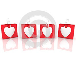 Red shopping bags with white hearts