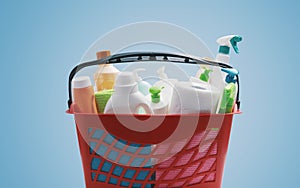 Red shopping basket with cleaning products